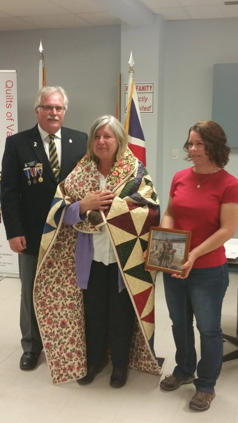 Steve Schmitt at a Quilts of Valour presentation honouring a veteran